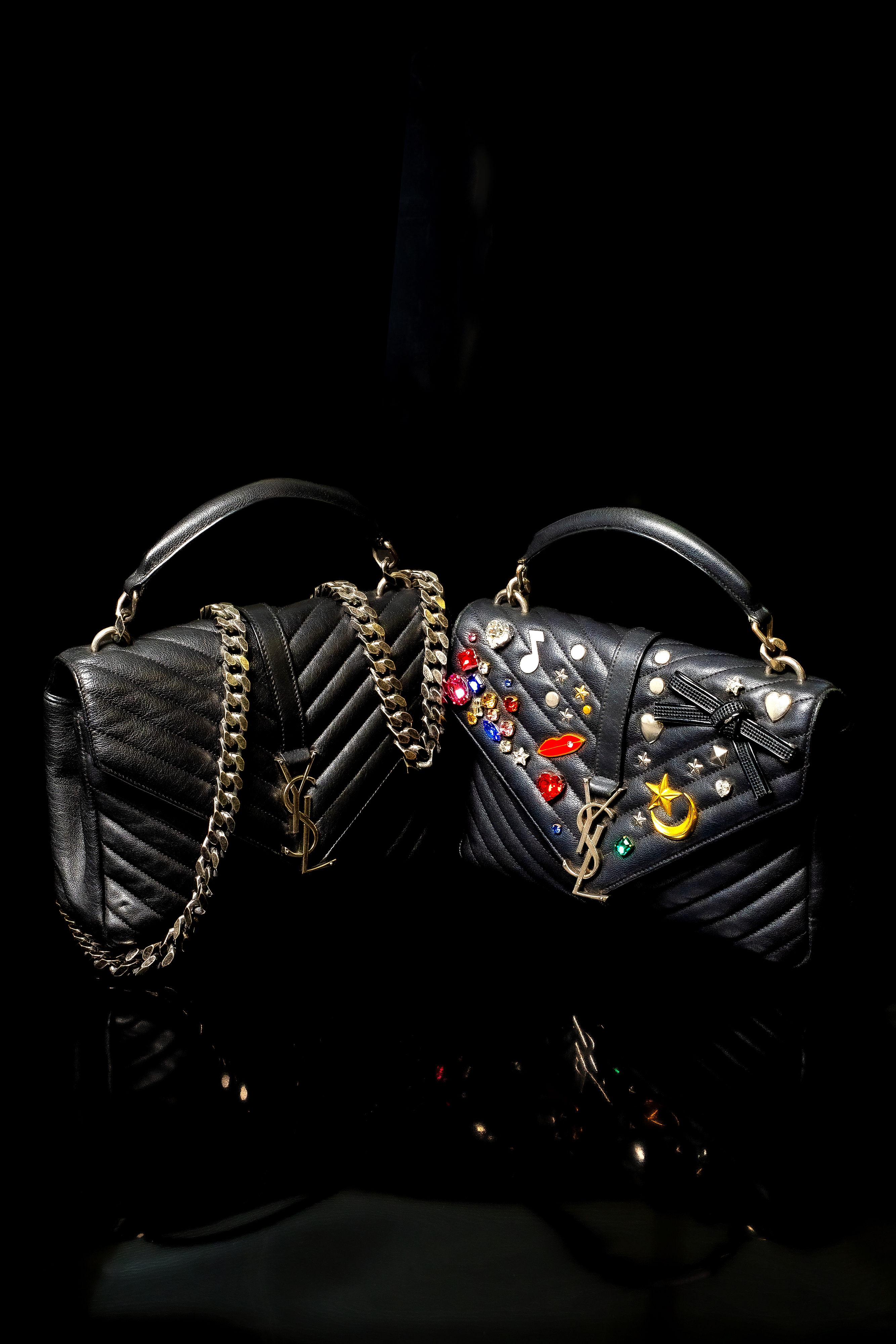 Two black YSL bags from Marketing folder